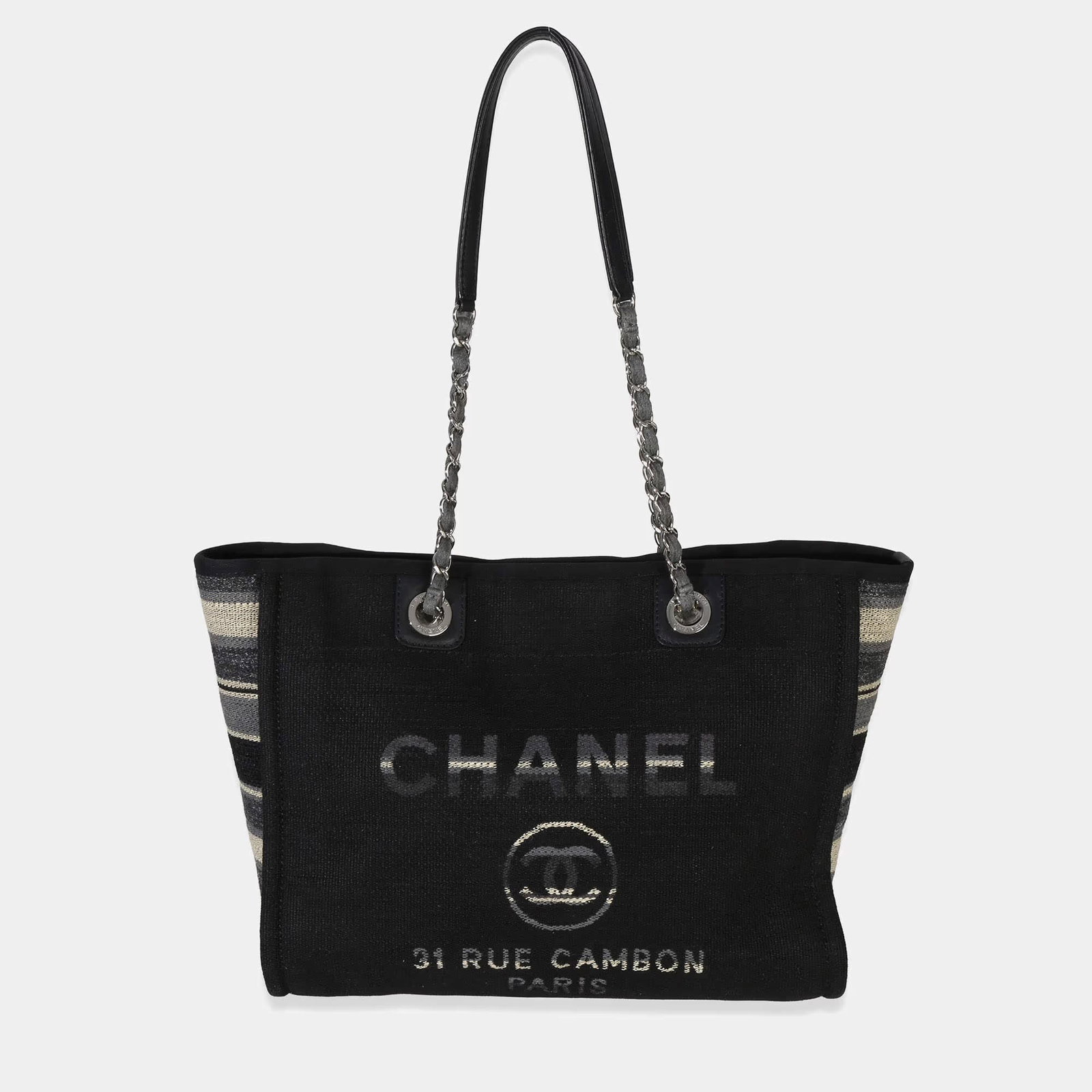 CHANEL DEAUVILLE TOTE: CHANEL DEAUVILLE TOTE Black Canvas & Chain Shoulder ToteAn iconic and effortlessly chic Chanel Deauville Tote crafted in black canvas with signature striped detailing and silver-tone chain