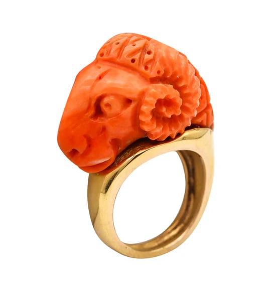 Italian cocktail ring with carved ram head.This is a stunning cocktail ring, created in Italy back: Italian cocktail ring with carved ram head.This is a stunning cocktail ring, created in Italy back in the 1970. The flamboyant exotic ring has been made up in solid yellow gold of 18 karats with high 