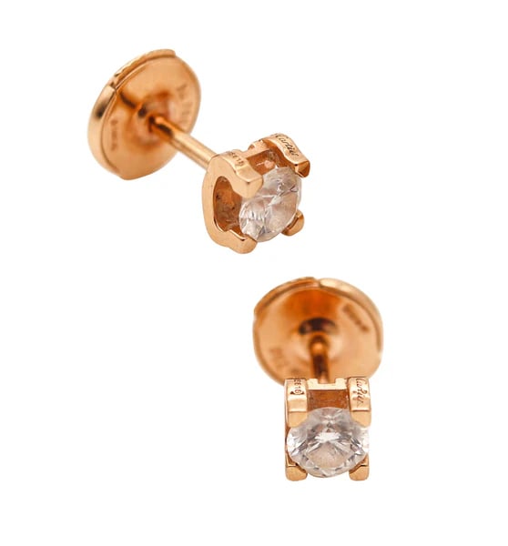Diamonds earrings studs designed by Cartier.These are a modern studs earrings created in Paris: Diamonds earrings studs designed by Cartier.These are a modern studs earrings created in Paris France by the jewelry house of Cartier. This pair is from the C de Cartier collection and was crafted in 
