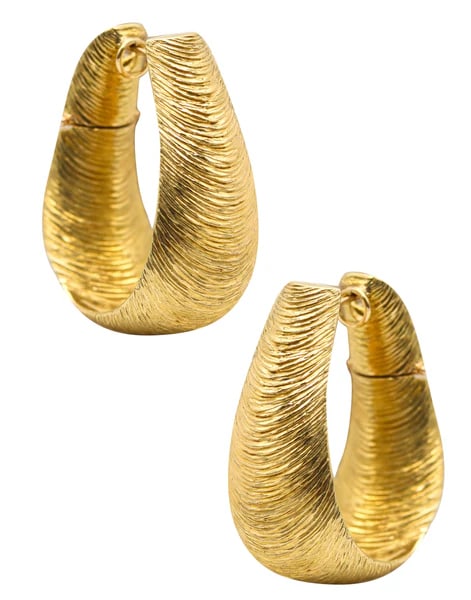 Hoops earrings designed by Henry Dunay.This is a outstanding pair of hoops earrings, created in New: Hoops earrings designed by Henry Dunay.This is a outstanding pair of hoops earrings, created in New York City at the jewelry atelier of Henry Dunay, back in the 1980. The vintage earrings have been cr