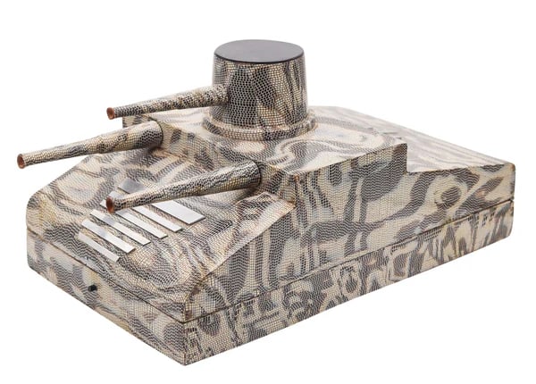 FRENCH 1918 Art-Deco Lacquered Desk Cigar Box In The Shape of a WWI Tank: An art deco WWI Tank shaped desk cigar box humidor.This is a fabulous and rare desk cigar box-humidor created in France during the art deco period, circa 1918. The amazing piece is very decorative and
