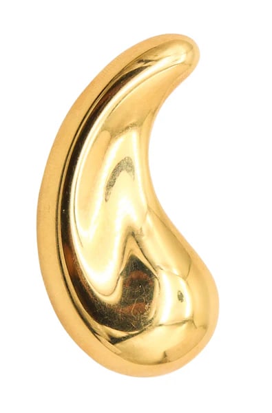 TIFFANY & CO. 1983 Elsa Peretti "Comma" Pendant-Brooch In 18Kt Yellow Gold: "Comma" brooch-pendant designed by Elsa Peretti for Tiffany & Co.This is a beautiful comma brooch created by Elsa Peretti for the jewelry house of Tiffany & Co., back in the 1983. The iconic piece has