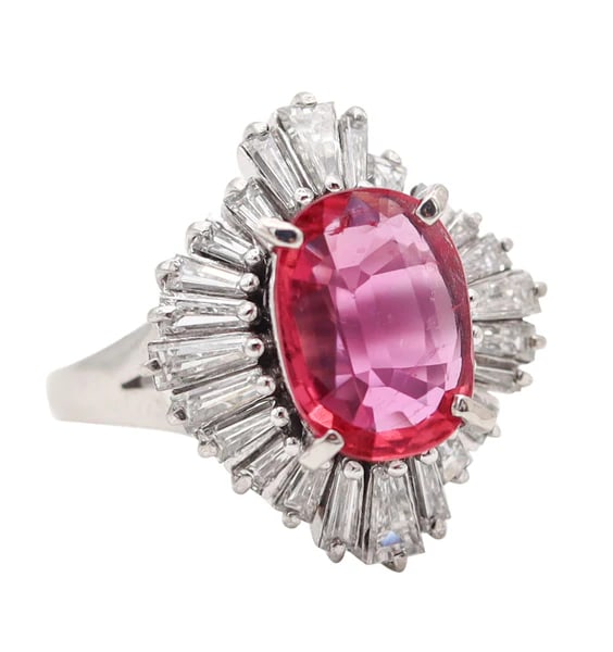 BALLERINA Cocktail Ring In Platinum With 3.98 Cwt. In Red Ruby And Diamonds: A classic cocktail ring in platinum with ruby and diamonds.This is a classic ballerina cocktail ring created during the mid-century and the modernist periods, back in the 1960. The ballerina cluster r