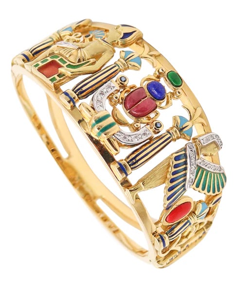 EGYPTIAN REVIVAL Bangle Bracelet In 18Kt Yellow Gold With Gemstones & Enamel: An Italian Egyptian revival bangle bracelet.This is a fabulous and colorful bangle bracelet created in Italy with Egyptian revival patterns. The beautiful bracelet has been masterfully crafted in soli