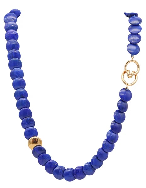 TIFFANY & CO. 1980 Angela Cummings Lapis Lazuli Lentil Necklace In 18Kt Gold: Lentils necklace designed by Angela Cummings for Tiffany & Co.This very rare and elegant lentils necklace, was created in New York city by Angela Cummings for Tiffany & Co., back in 1980. This moderni