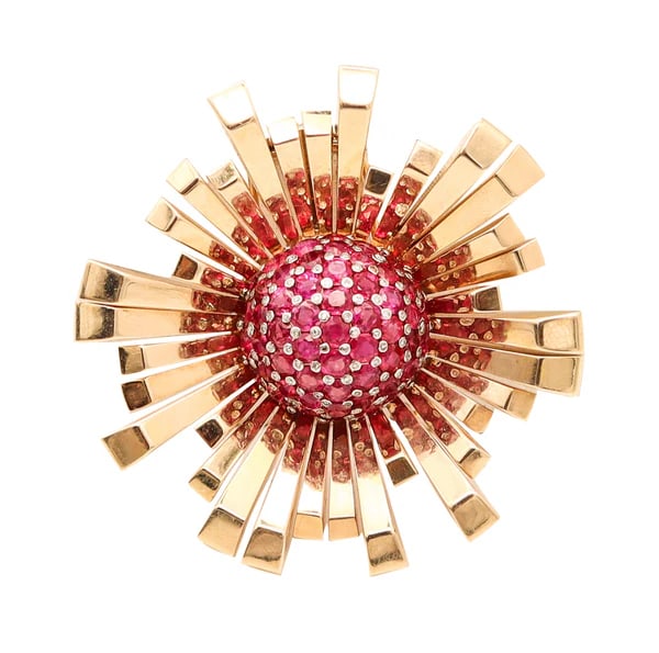 TIFFANY & CO. 1950 Retro-Modern Brooch 18Kt Yellow Gold With 6.48 Cwt Rubies: A post war retro-modern pendant brooch designed by Tiffany & Co.This pendant-brooch is a superb statement piece, with gorgeous eye appeal created in New York City by the American jewelry house of Tiff