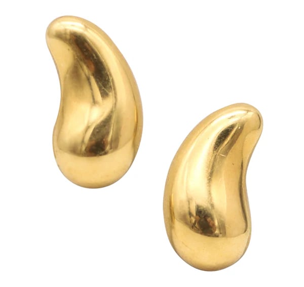 TIFFANY & CO. 1980 Elsa Peretti Tear Drops Clips-On Earrings In 18Kt Yellow Gold: Medium tear-drops clips earrings designed by Elsa Peretti for Tiffany & Co.This is a pair of tears-drops clips-on earrings, created by Elsa Peretti for the jewelry house of Tiffany & Co., back in the 
