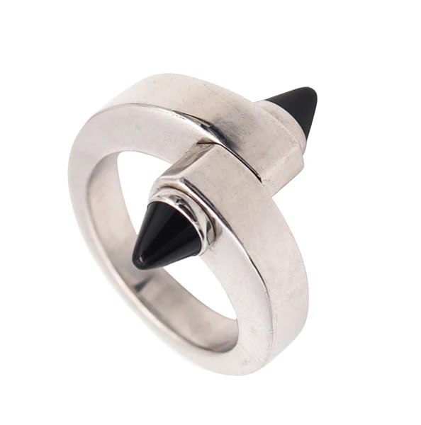 CARTIER Paris Geometric Menotte Bypass Ring In 18Kt Gold With Black Onyx Sz 51: Menotte bypass ring designed by Cartier.This is a beautiful Menotte ring created in Paris France by the iconic jewelry house of Cartier. The iconic sculptural bypass ring has been crafted with industr