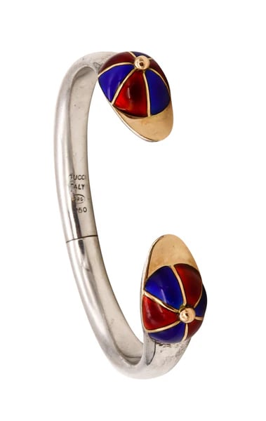 Gucci Milan 1970 Rare Equestrian Jockey Hats Cuff In 18Kt Gold And Sterling With Red & Blue Enamel: Enameled Jockey Hats cuff designed by Gucci.Very rare vintage Equestrian jockey Hats cuff created by the Gucci house in Milano, circa 1970's. This iconic elegant bracelet was crafted in solid .925/,99