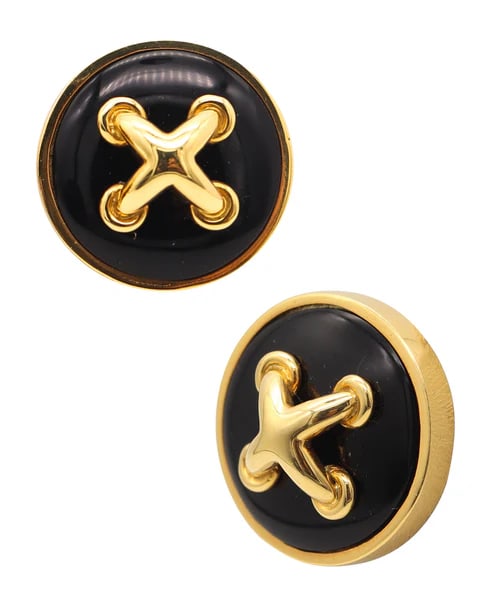 ALDO CIPULLO 1973 Buttons Knots Clips On Earrings In 18Kt Gold With Onyxes.: Pair of ear-clips designed by Aldo Cipullo (1936-1984).These are an elegant pair of clips-on earrings created in New York City by the jewelry designer Aldo Cipullo, back in 1970. The button?s shaped e