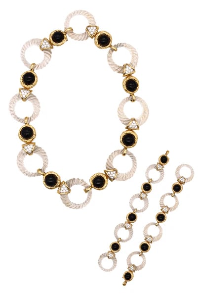 Boucheron 1970 Paris Convertible Necklace Bracelets In 18Kt With 48.84 Cts In Diamonds And Rock: Pair of convertible bracelets-necklace designed by Boucheron.Beautiful pair of French pieces created, circa 1970's at the Vassort atelier in Paris. This convertibles bracelets was carefully crafted by