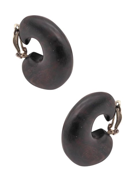 CATHERINE NOLL 1970 French Clips-On Earring Sculpted In Wood & .925 Sterling Silver: Pair of clips on earrings designed by Catherine Noll (1945-1992).This is a fantastic pair of clips-on earrings, created in France by the artist jeweler Catherine Noll, back in the 1970's. The earrings