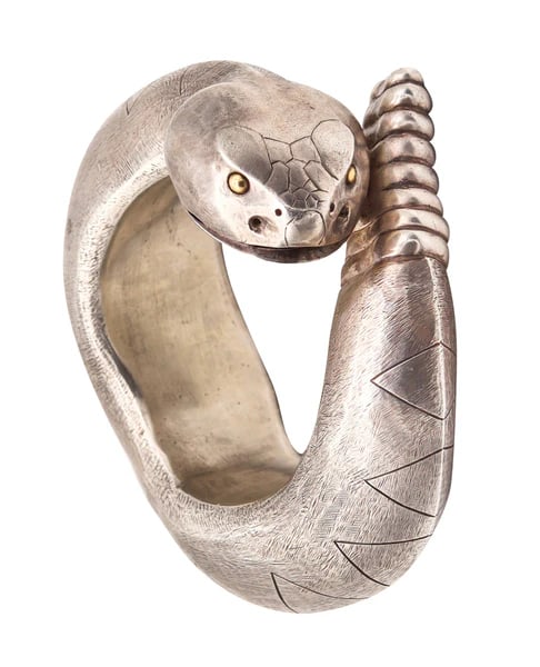 Navajo 1970 Statement Bold Stylized Snake Bracelet In 925 Sterling Silver And 18Kt Gold: An statement stylized Navajo snake bracelet.Beautiful oversized statement tribal bracelet bangle, created by the Navajos in the west part of the United States, back in the 1970's. This amazing piece h
