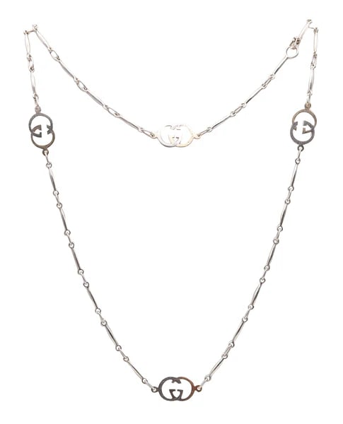 GUCCI 1970 Firenze Vintage G's Long Sautoir In Sterling And 18Kt Yellow Gold: Long double G necklace sautoir designed by Gucci.This rare statement sautoir necklace was created in Florence Italy by the luxury house of Gucci, back in the 1970's. The sautoir necklace is vintage an