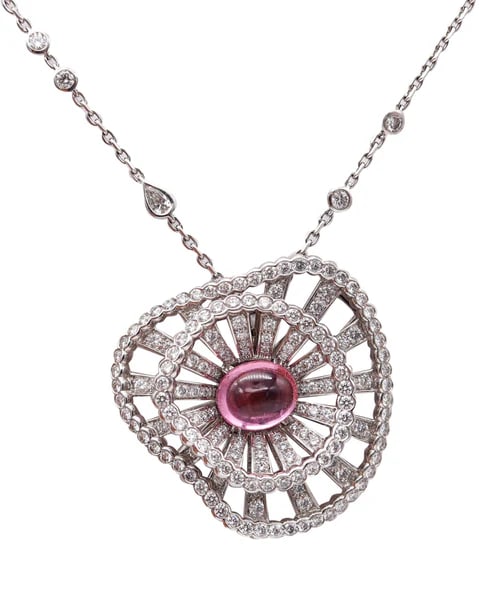Boucheron Paris Necklace Brooch 18Kt Gold With 17.69 Ctw Diamonds And Tourmaline: Necklace pendant brooch designed by Boucheron.This gorgeous necklace, is one of the most ultimate creations from the jewelry house of Boucheron. A magnificent convertible necklace-pendant from the Bou