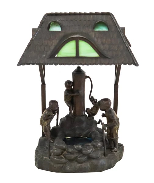 OSWALD SCHIMMELPFENNIG 1890 Table Lamp With Childrens In a Water Pump: Table desk lamp designed by Oswald Schimmelpfennig.This is an unusual whimsical table lamp, created in Berlin Germany by Oswald Schimmelpfennig, back in the 1900. The antique lamp has been masterfully