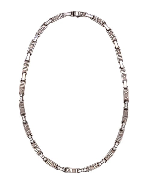 Tiffany & Co. Atlas Roman numerals necklace in solid 18 kt white gold with 1.50 Cts in VS diamonds: A jeweled Atlas necklace designed by Tiffany & Co.This piece is one of the most ultimate iconic moderns creation by Tiffany. made at the beginning of the 21th century and part of the popular Atlas col