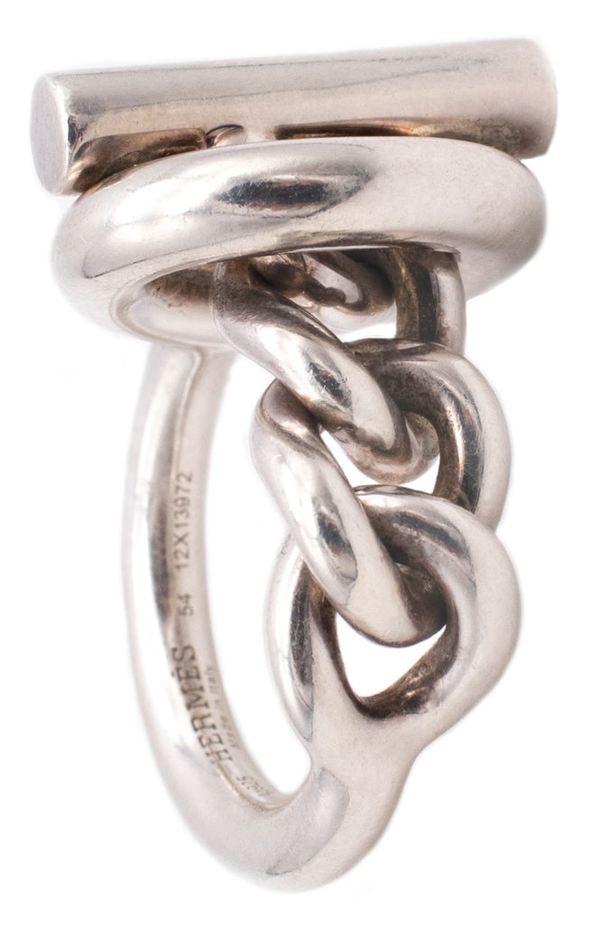 HERMES PARIS CROISETTE TOGGLE CHAINED RING IN .925 STERLING SILVER: VERY NICE CROISETTE RING DESIGNED BY HERMES, PARIS.A RARE VINTAGE PIECE MADE BY THIS FAMOUS FRENCH MAISON WITH THE ICONIC CHAIN LINK AND A TOGGLE. IS HAND CRAFTED IN SOLID .925 STERLING SILVER AND FIN