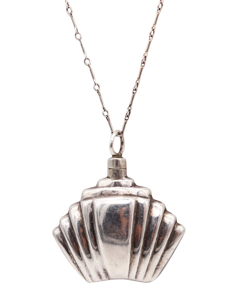 ART-DECO 1930 Skyscraper Perfume Bottle Necklace Chain In .925 Sterling Silver: An art-deco skyscraper perfume bottle necklace.This is a beautiful and highly wearable perfume bottle necklace created in New York City during the Art Deco period, circa 1930. The piece has been caref