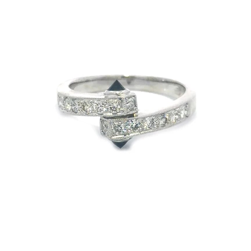 Diamond Gold Bypass Ring 18k White Gemstone Milgrain Border Style: The diamond and gold Bypass Ring is a lovely piece of fine jewelry crafted with an 18k white gold. The ring features a bypass style on the front half with prong set diamonds accented with black gemsto