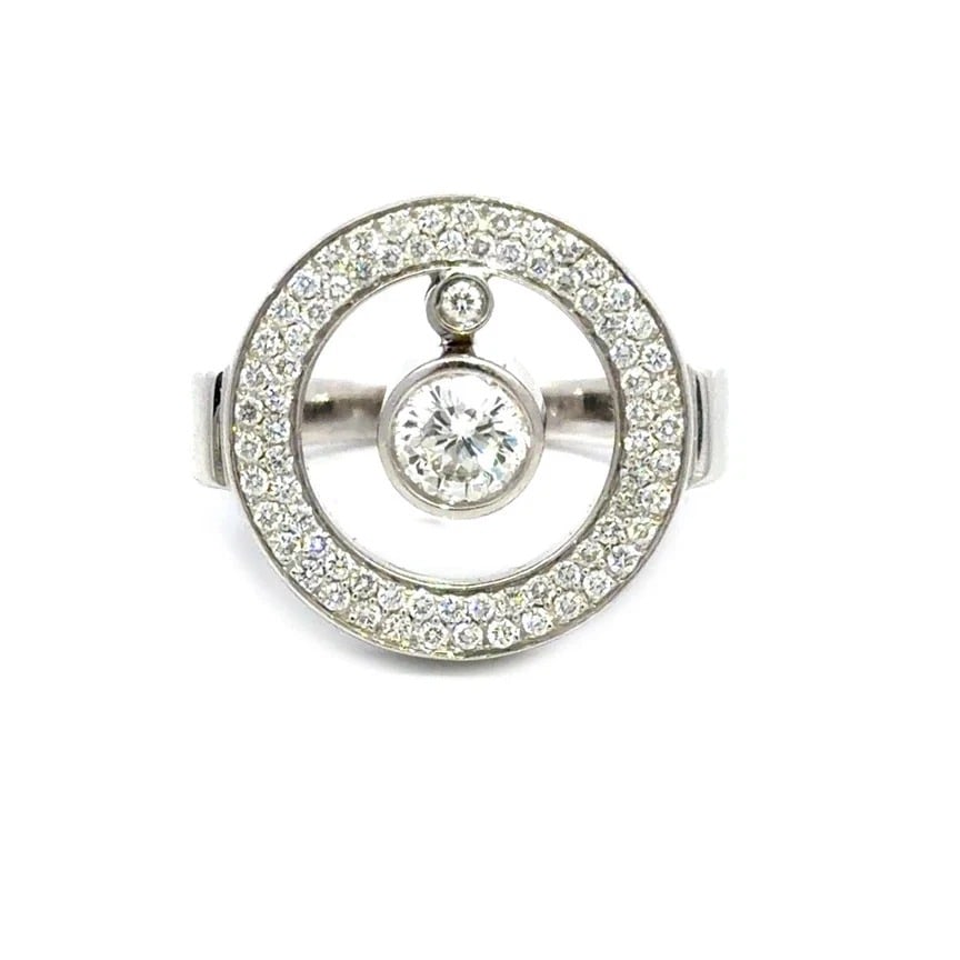 Roberto Coin Cento Gold Ring 2 Dangle Diamond Circle Style Pave Bezel: The Roberto Coin 18k white gold ring is from the Cento Collection, It feature a small and large bezel set natural white diamond hanging inside the open circle frame of the ring, the round bezel has pa
