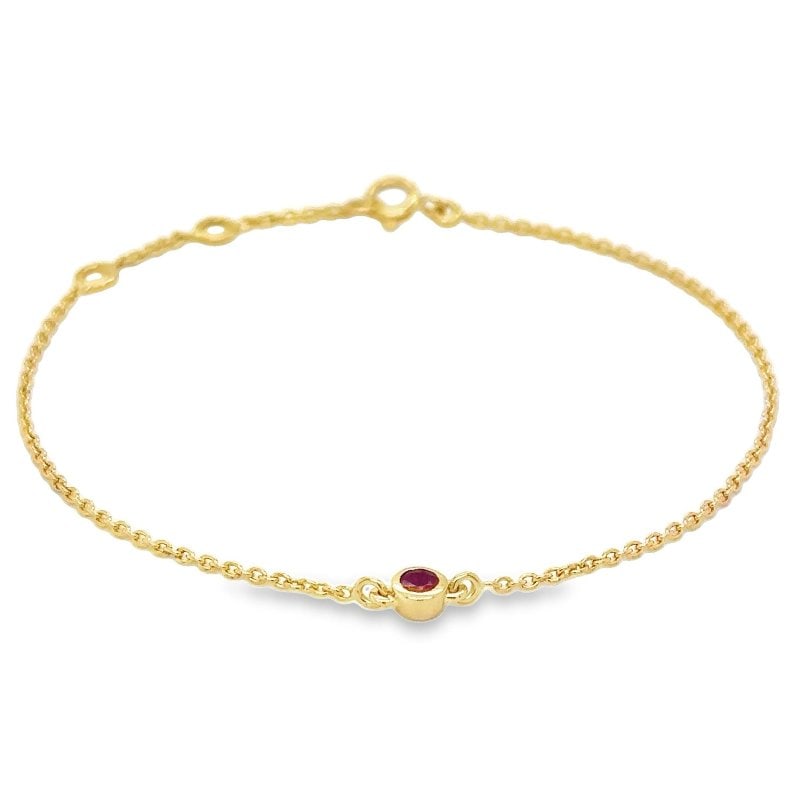 14KT YELLOW GOLD RUBY BRACELET: 14KT YELLOW GOLD RUBY BEZEL CHAIN BRACELET 7"14KT GOLD WT. APPROX. 1.17 GRAMRUBY WT. APPROX. 0.16 CARATEXTENDER RING ON 6" AND 6.5"