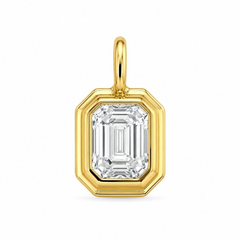 14KT GOLD DIAMOND PENDANT: 14KT YELLOW GOLD EMERALD SHAPE DIAMOND PENDANT14KT. GOLD WT. APPROX. 0.41 GRAMDIAMOND WT. APPROX. 0.2 CARAT / 1 PC
