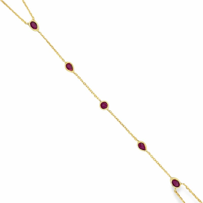 14KT GOLD RUBY HAND CHAIN: 14KT GOLD WT. APPROX. 1.75 GRAMRUBY WT. APPROX. 0.90 CARAT/ 5 PCSWRIST TO FINGER LENGTH APPROX. 3.5 INCHES LONGWRIST LENGTH APPROX. 8 INCHES LONG (6.5 INCHES TO 7 INCHES ADJUSTABLE)