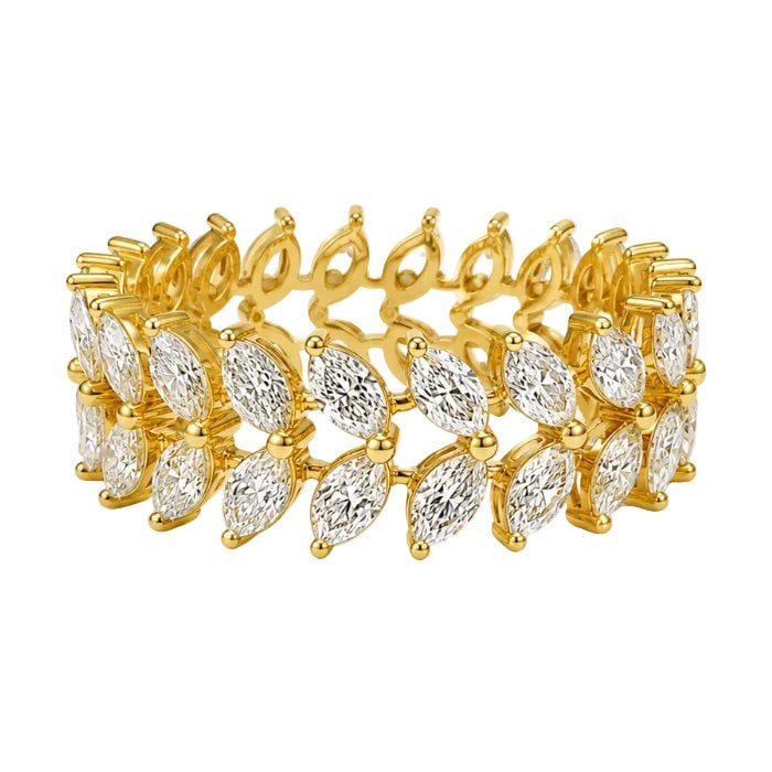 14KT YELLOW GOLD MARQUISE DIAMOND ETERNITY BAND: 14KT YELLOW GOLD MARQUISE SHAPE AQUAMARINE ETERNITY BAND14KT GOLD WT. APPROX. 2.92 GRAMAQUAMARINE WT. APPROX. 3.76 CARAT/ 18 PCSSTONE SIZE APPROX. 6 X 3 MMSIZE: 6