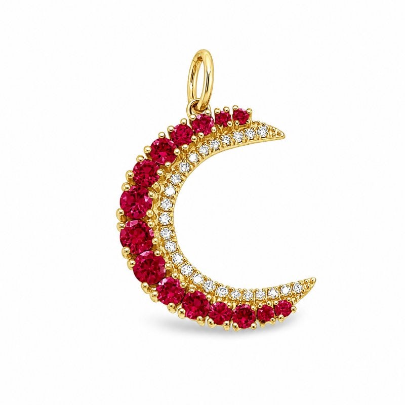14KT YELLOW GOLD HALF MOON PENDANT WITH RUBY AND DIAMONDS: 14KT GOLD WT. APPROX. 2.04 GRAMDIAMOND WT. APPROX. 0.15 CT / 25 PCSRUBY WT. APPROX. 0.95 CARAT / 15 PCSSIZE: 17 MM X 22 MM (WITHOUT LOOP)