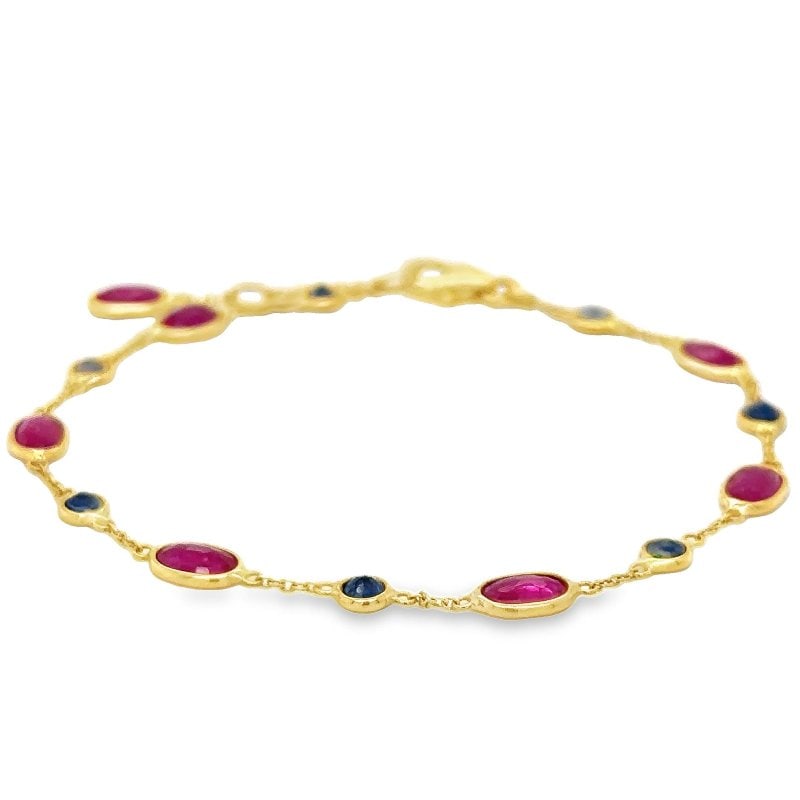 18KT YELLOW GOLD RUBY AND SAPPHIRE STATION BRACELET (1 of 4)