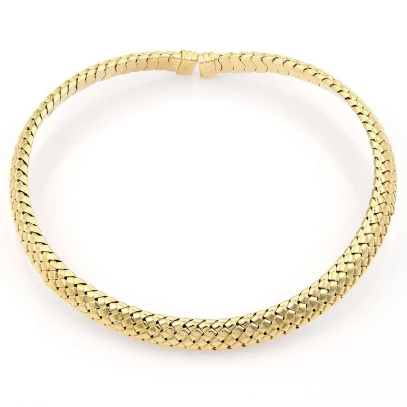 Tiffany & Co. Gold Choker Necklace Vannerie 18k Yellow Basket Weave Design: This Tiffany & Co. gold choker necklace is from the Vannerie Collection. It is a stunning piece crafted in 18k yellow gold with a beautiful basket weave design. The piece is signed by the renowned