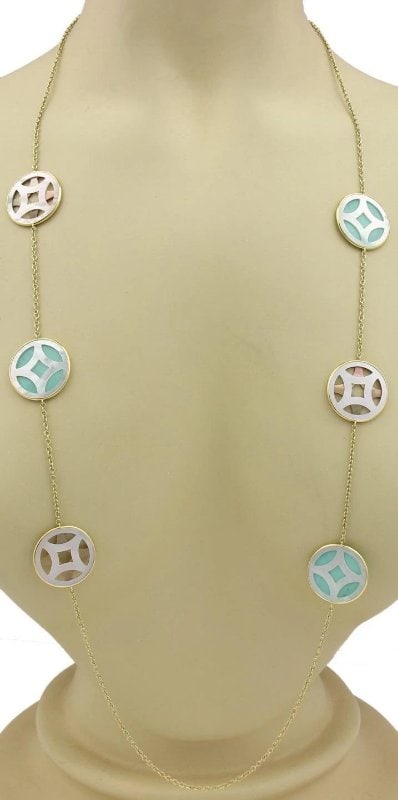 Ippolita Necklace Mother of Pearl Turquoise 18k Y/Gold 6 Round Station: The Ippolita Necklace features a stunning combination of natural turquoise and mother of pearl stones set in 18k yellow gold. The necklace has a length of 37 inches and showcases six round stations