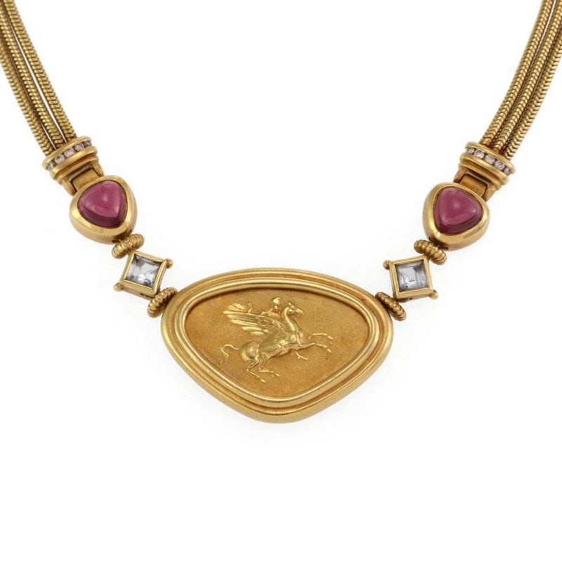 Seidengang Diamond & Gems Necklace 18k Gold Pegasus Pendant Triple Chain: This is an authentic eye catching pendant and tripl chain necklace by designer Seidengang. It is crafted from 18k yellow gold with a polished and satin finish featurin 3 strands of 2mm thick snake cha