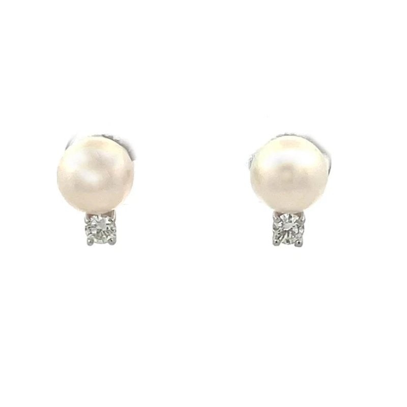 Tiffany & Co. Signature Pearl Stud Earrings Diamond 18k White Gold w/Box: These elegant Tiffany & Co. Signature Pearl Stud Earrings are in 18k white gold are a luxurious and elegant piece of fine jewelry. The earrings feature a round white pearl as the main stone, set on a 