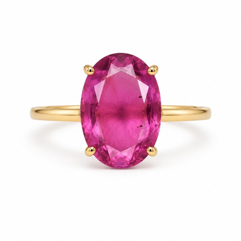 14KT GOLD TOURMALINE RING: 14KT GOLD WT. APPROX. 1.66 GRAMTOURMALINE WT. APPROX. 2.45 CARAT EACH STONE IS MISMATCHED IN SHAPE