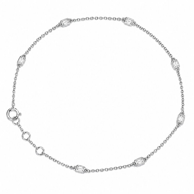 14KT GOLD BAGUETTE DIAMOND STATION BRACELET: 14KT WHITE GOLD BAGUETTE DIAMOND STATION BRACELET14KT GOLD WT. APPROX. 0.958 GRAM DIAMOND WT. APPROX. 0.06 CT/ 7 PCS 7 INCHES LONG 1 INCH ADJUSTABLE