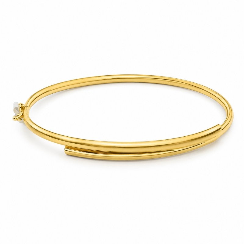 14KT YELLOW GOLD BANGLE: 14KT GOLD WT. APPROX. 3.85 GRAMSTHICKNESS - 3.00MMINTERIOR DIAMETER: 2.3"