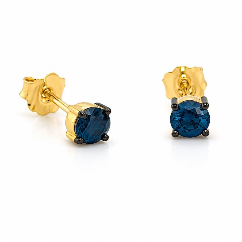 14KT GOLD BLUE DIAMOND EARRING STUDS: 14KT YELLOW GOLD BLUE DIAMOND EARRING STUDS14KT GOLD WT. APPROX. 0.42 GRAMDIAMOND WT. APPROX. 0.22 CARAT / 2 PCSSIZE: 3 MM
