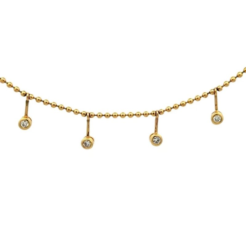 Diamond Gold Bead Necklace 14k Yellow Bezel Set Dangle Station: The Diamond gold fine bead necklace is a lovely piece of fine jewelry featuring a 14k yellow gold chain with 6 bezel set white natural diamond stations dangling from the chain with short bars. The nec