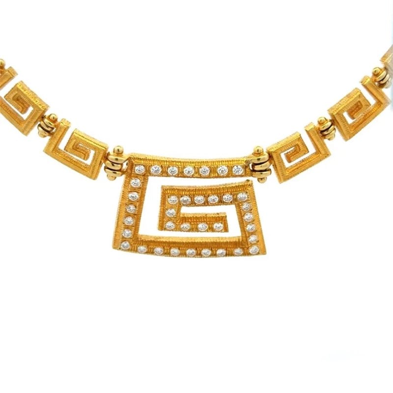Lalaounis Neo-Geometric Gold Necklace Greek Key Diamond Collar Necklace: This stunning collar necklace is a genuine work from the Ilias Lalaounis Neo-Geometric Collection produced circa the 1970-1980s. Crafted from 18k yellow gold showcases the ancient Hellenic Meander (Gr