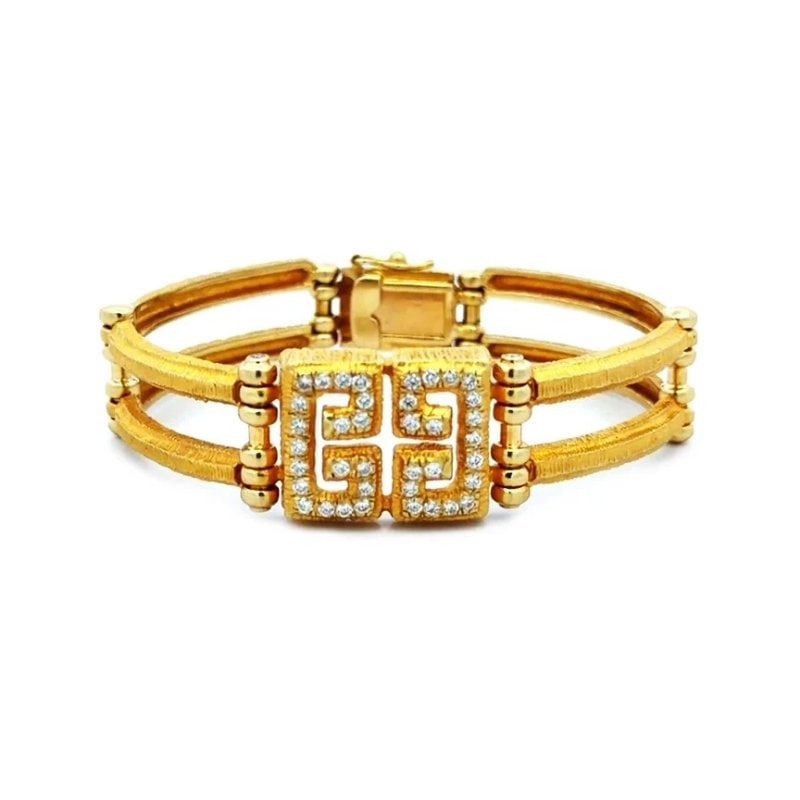 Maramenos & Pateras Gold Bracelet Diamond Quad Symmetry 18k Yellow: This lovely bracelet is by Maramenos & Pateras from the Symmetry Collection/Quad Symmetry, the focal point features a geometric square centerpiece resembling a stylized double G with pave set natural 