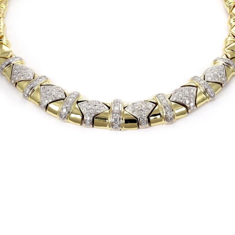 Necklace Diamond 18k Gold Graduated Geometric Link Collar: This is a beautiful geometric link collar necklace, it is crafted from 18k yellow and white gold with a polished finish. The link are graduated in size, larger from the center. Approximately 5 inches 