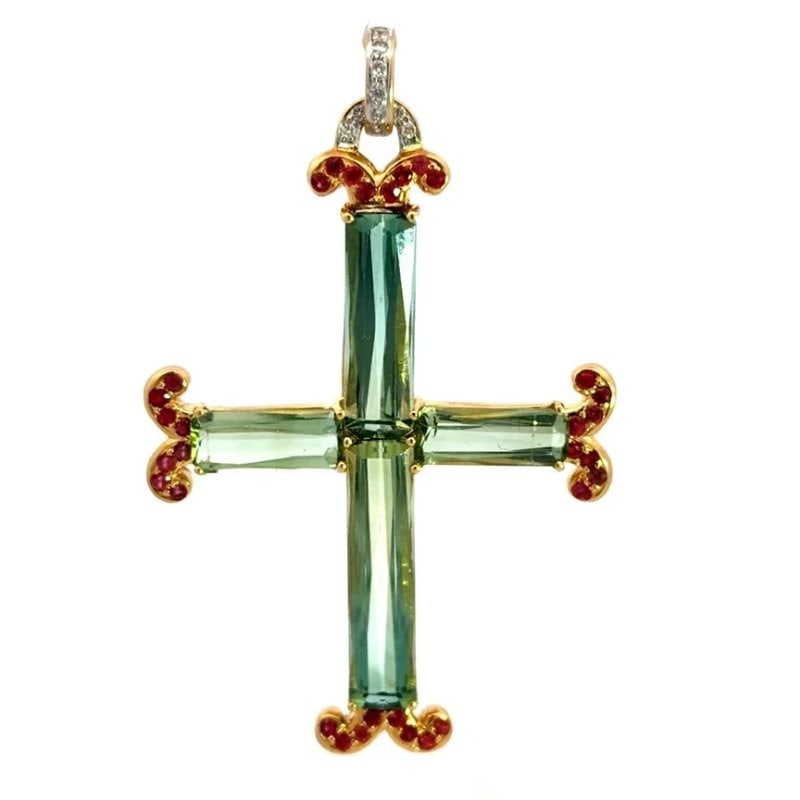 Tourmaline Gold Cross Pendant Diamond 18k Yellow Floral Style 2.3" long Vintage: This adorable gold cross pendant features a gorgeous green long cut tourmaline stone set in 18k yellow gold accented on each end with red gemstones and diamonds on the bail. The pendant has a floral s
