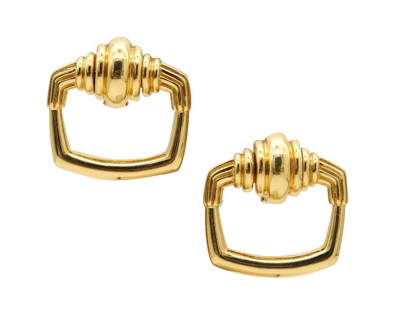 CARTIER 1971 Aldo Cipullo Door Knocker Earrings In Solid 18Kt Yellow Gold: Pair of door knocker’s earrings designed by Aldo Cipullo (1936-1984) for Cartier.This rare pair of rectangular door-knocker clip earrings was created in New York City in 1971 for the house of Cartie