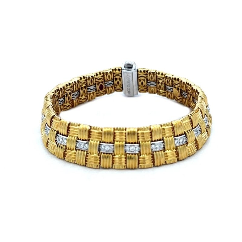 Roberto Coin Appassionata Gold Bracelet Diamond 18k Two Tone 3 Row Style: The Roberto Coin Appassionata 18k yellow and white gold bracelet is a stunning piece of fine jewelry featuring natural white pave set diamonds in a 18k white gold. The bracelet showcases a beautiful b