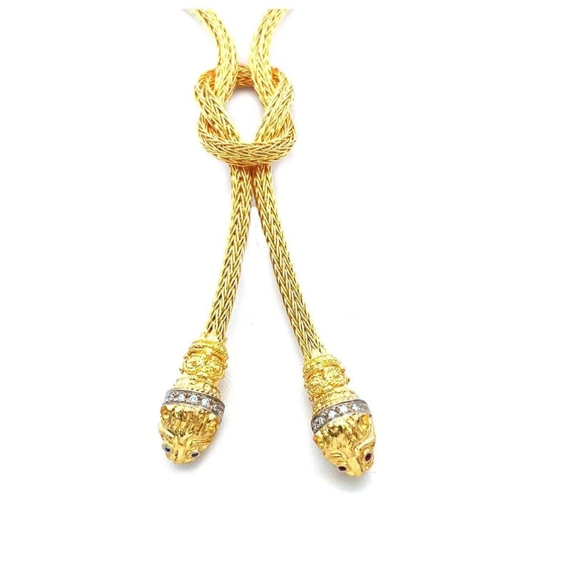 Lalaounis Hercules Knot Gold Necklace Diamond 18k Yellow Lions Lariat Style: This gorgeous lariat necklace is by Greek designer Ilias Lalaounis from the Hercules Knot Collection. The central focal point is a hand-woven Hercules Knot, an ancient Greek symbol representing heroic