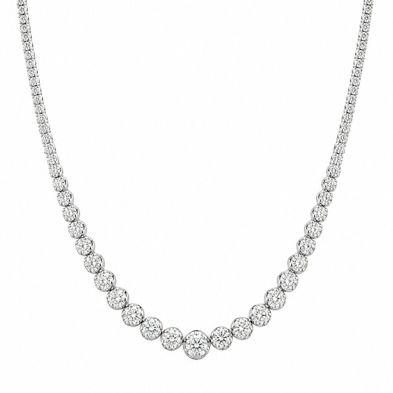 14KT WHITE GOLD DIAMONDS BUTTERCUP GRADUATED NECKLACE: 14KT WHITE GOLD DIAMONDS BUTTERCUP GRADUATED 16" NECKLACE14KT GOLD WT. APPROX. 9.68 GRAMDIA. WT. APPROX 3 CT / 176 PCS LENGTH: 16INCHES