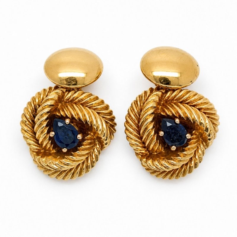CARTIER 1960’s 18K Yellow Gold Sapphire Cufflinks: CARTIER 1960’s 18K Yellow Gold Sapphire Cufflinks Weighing 12.3 gramsSet with 2 Sapphires weighing app. 0.60 Ct.