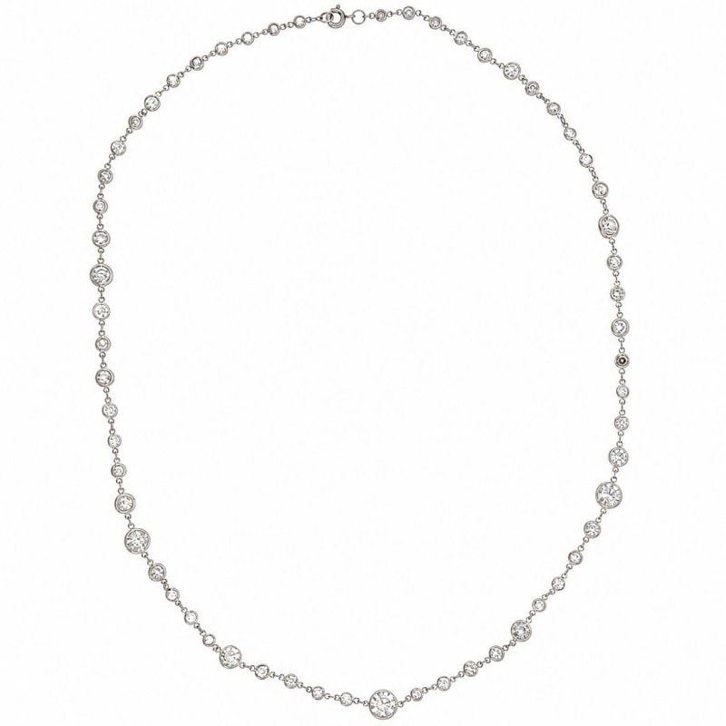 Art Deco Platinum 12.50 Ct. Diamond by the Yard Necklace: Art Deco Platinum 12.50 Ct. Diamond by the Yard Necklace Weighing 8.4 gramsSet with 60 European-cut Diamonds weighing app 12.50 Ct. G-I Color, VS1-SI2 Clarity20 inches in length